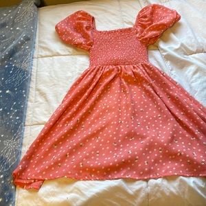 Girls pink dress with ruffle short sleeves with white flowers some have vines